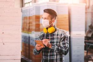 man-supervisor-inspecting-warehouse-during-covid19-quarantine-picture
