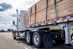 a wholesale lumber suppliers delivery semi truck