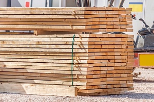 stack of untreated lumber in a lumber yard