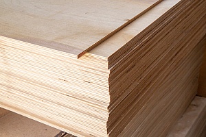 a stack of treated plywood