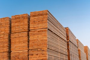 Big stack of lumber stocked in the godown due to less demand